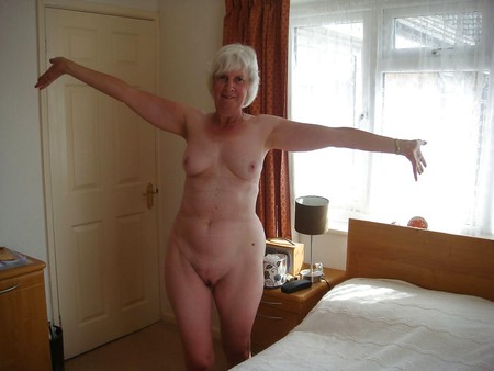 naked grandma at home on the bed