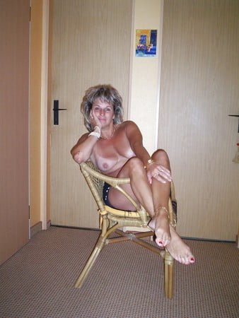 Mature with nice tits and tan lines